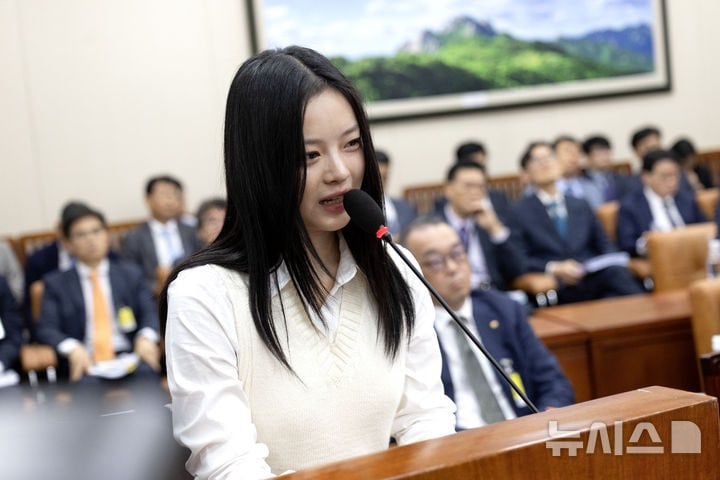 NewJeans’ Hanni’s Remarks at the National Assembly Spark Rumors of Discrimination: “Is a 5.2 Billion Won Idol a Worker?”